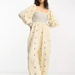 Free People Dahlia Jumpsuit (L) NWT. Cream and Navy.